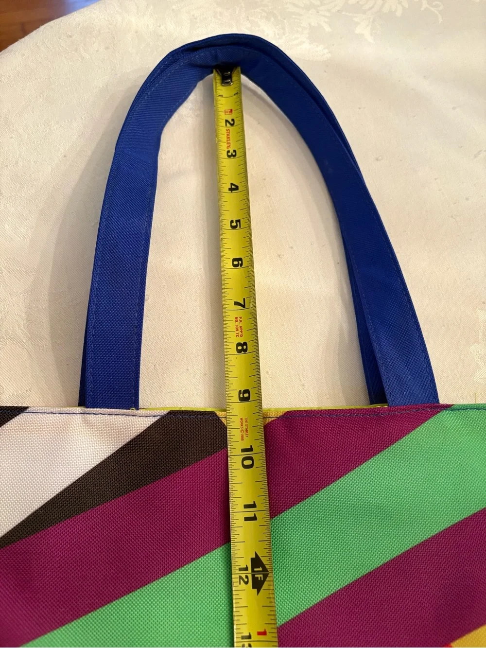 Clinique Multi-Color Diagonal Stripe Tote with Blue Handles